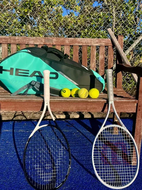 Tennis rackets and gear courtside